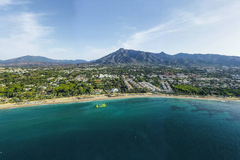 Aerial view of Marbella, a small town along the Mediterranean Sea coastline in Andalusia, Spain. - AAEF19246