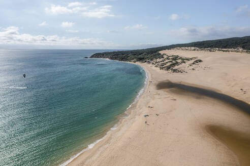Aerial view of Playa Valdevaqueros, a small beach along the Mediterranean Sea coastline, Tarifa, Cadiz, Spain. - AAEF19253