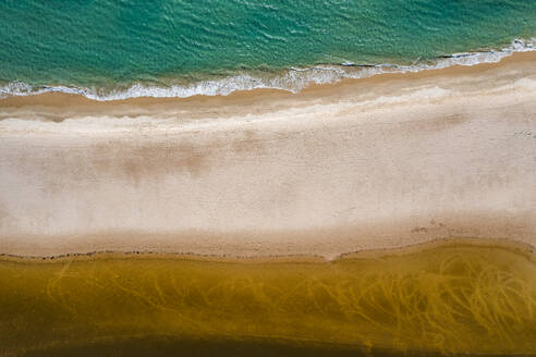 Aerial view of Playa Valdevaqueros, a small beach along the Mediterranean Sea coastline, Tarifa, Cadiz, Spain. - AAEF19254