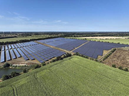 Aerial view of peatland photovoltaic panels at the ecological Solarpark Klein Rheide, Schleswig-Holstein, Germany. - AAEF19364