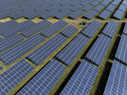 Aerial view of peatland photovoltaic panels at the ecological Solarpark Klein Rheide, Schleswig-Holstein, Germany. - AAEF19372