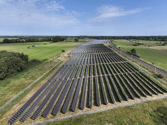 Aerial view of peatland photovoltaic panels at the ecological Solarpark Klein Rheide, Schleswig-Holstein, Germany. - AAEF19376