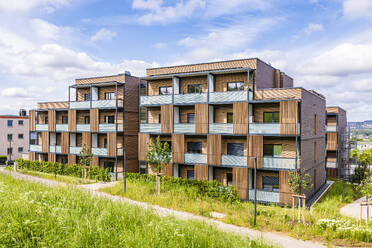 Germany, Baden-Wurttemberg, Stuttgart, Balconies of modern suburban apartment building - WDF07314
