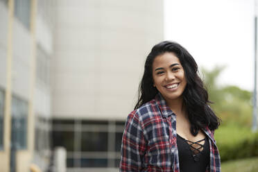 Portrait of smiling young woman - ISF26080