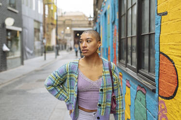 Hipster young woman standing in street - ISF26144