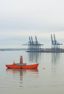 Cranes at Port of Felixstowe and calm sea, UK - ISF26261