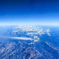 Aerial view of mountains with blue sky - CMF00899