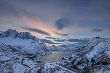 Norway, Nordland, View of Melfjorden and surrounding mountains in winter - RUEF04100