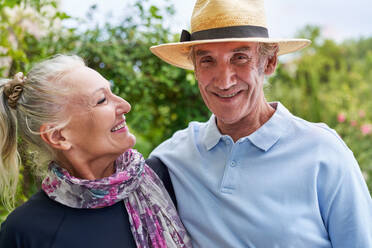 Portrait happy senior couple outdoors - CAIF33810