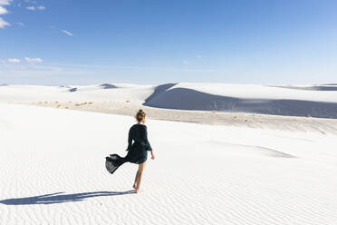 United States, New Mexico, White Sands National Park, Teenage girl walking - TETF02194