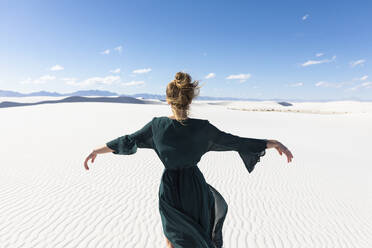 United States, New Mexico, White Sands National Park, Teenage girl dancing - TETF02197