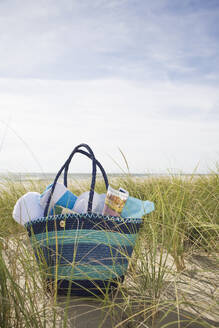 Beach bag with towels on beach, Nuntucket Island - TETF02207