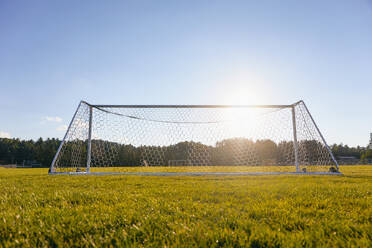 Soccer goal in field in sunshine - TETF02208