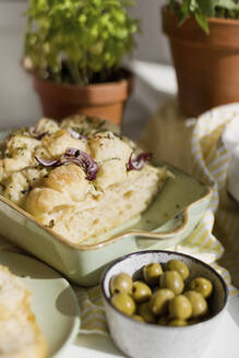 Freshly baked Focaccia bread with onion and black sesame seeds - ONAF00578