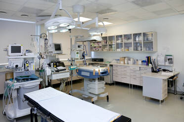 Intensive care unit, Tartu University children clinic, a modern hospital room with a treatment bed and an incubator crib. - MINF16629