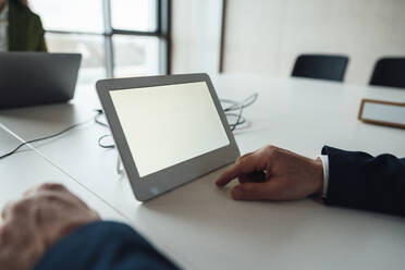 Businessman with tablet PC at desk - JOSEF20251