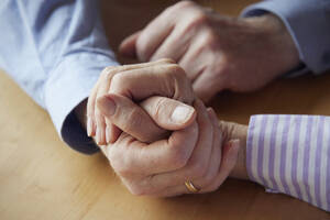 Close-up of senior couple holding hands - RBF09268