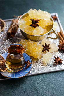 Iranian crystal rock candy and spices in the vintage metal cup - ADSF45884