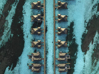 Aerial view of overwater bungalows at Himmafushi Atoll, Maldives. - AAEF19387