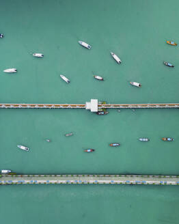 Aerial view of Chalong pier full of boats in Phuket, Thailand. - AAEF19432