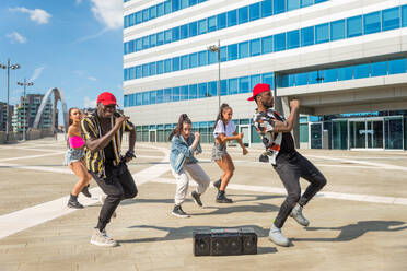 Hip hop crew dancing - Multiracial group of people having fun outdoors - DMDF00502