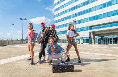 Hip hop crew dancing - Multiracial group of people having fun outdoors - DMDF00507