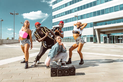 Hip hop crew dancing - Multiracial group of people having fun outdoors - DMDF00508