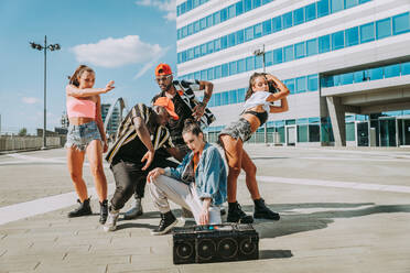 Hip hop crew dancing - Multiracial group of people having fun outdoors - DMDF00509