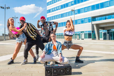 Hip hop crew dancing - Multiracial group of people having fun outdoors - DMDF00510