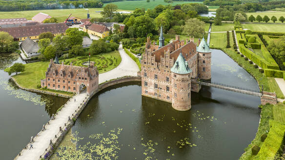 Denmark, Southern Denmark, Kvaerndrup, Aerial view of Egeskov Castle and surrounding park - AMF09942