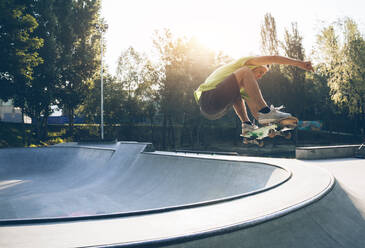 Professional skateboarders having fun at the skate park - DMDF00789