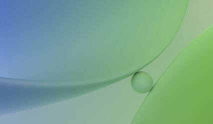 Three dimensional render of sphere between folds of green and blue smooth curvy fabric - MSMF00070