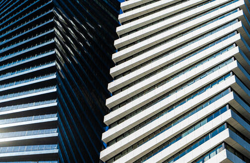 From below modern architecture of business downtown of Tbilisi city with twin towers on Chavchavadze avenue in capital city of Georgia - ADSF46247