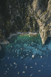 Aerial view of a coastline and boats in Capri, Naples, Italy. - AAEF19721