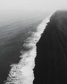 Aerial view of black sand beach and waves, Reynisfjara, Iceland. - AAEF19811