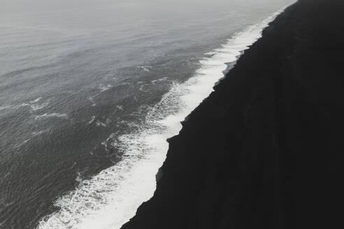 Aerial view of black sand beach and waves, Reynisfjara, Iceland. - AAEF19812