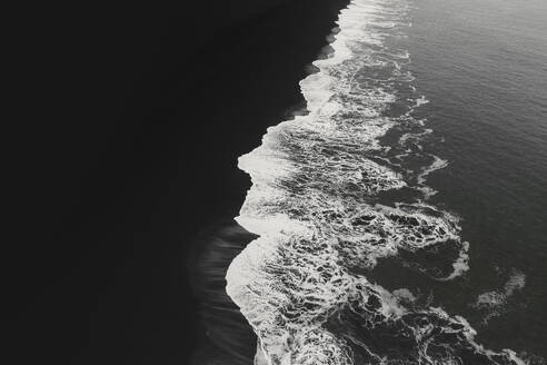 Aerial view of black sand beach and waves, Reynisfjara, Iceland. - AAEF19815