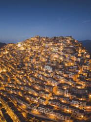 Aerial view of houses at night, Gangi, Sicily, Italy. - AAEF19857