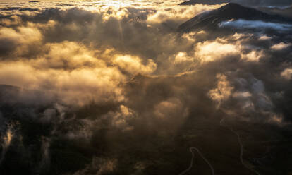 Aerial view of Thirsty Monster mountains range at sunset, Northern Spain, Spain. - AAEF19893