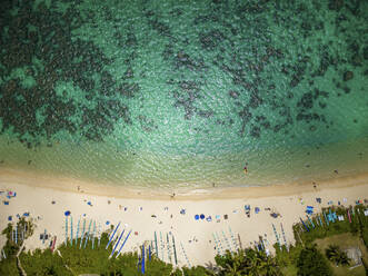 Aerial View of Lanikai Beach with outrigger canoe, Kailua, Hawaii, United States. - AAEF19926