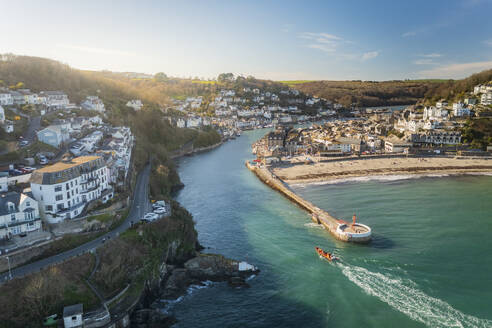 Aerial view of Looe Harbour and Banjo Pier with Looe River and town, Cornwall, United Kingdom. - AAEF19931