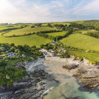 Aerial view of Talland Bay and countryside during golden hour, Cornwall, United Kingdom. - AAEF19940