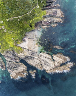 Aerial view of Talland Bay small hidden cove, Cornwall, United Kingdom. - AAEF19941