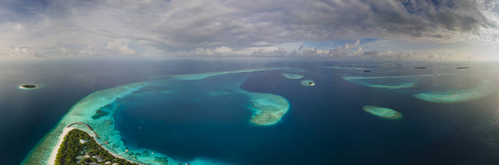 Panoramic aerial view of tropical island in the morning, Baa Atoll, Maldives. - AAEF20080