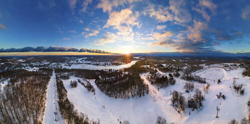 Panoramic aerial view from the top of a ski mountain looking back towards Deep Creek Lake, McHenry, Maryland, United States. - AAEF20166