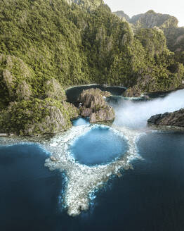 Aerial view of a natural rock pool at Twin Lagoon, Coron, Palawan, Philippines. - AAEF20208