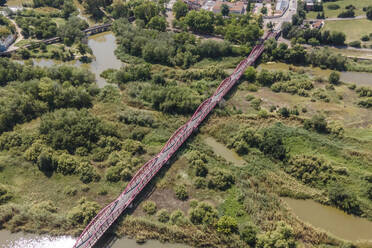 Aerial view of Reina Sofia bridge in Talavera de la Reina, a small town along the Tagus river in Toledo district, Spain. - AAEF20257