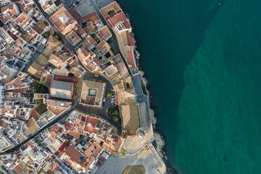 Aerial view of Sitges city hall in downtown at sunset along the Mediterranean Sea, Barcelona, Spain. - AAEF20264