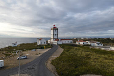 Aerial view of Cabo Carvoeiro lighthouse a sunset in Peniche, Leiria, Portugal. - AAEF20376