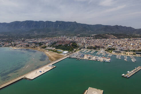 Aerial view of La Rapita, a small town with harbour along the Mediterranean Sea coastline, Tarragona, Spain. - AAEF20406